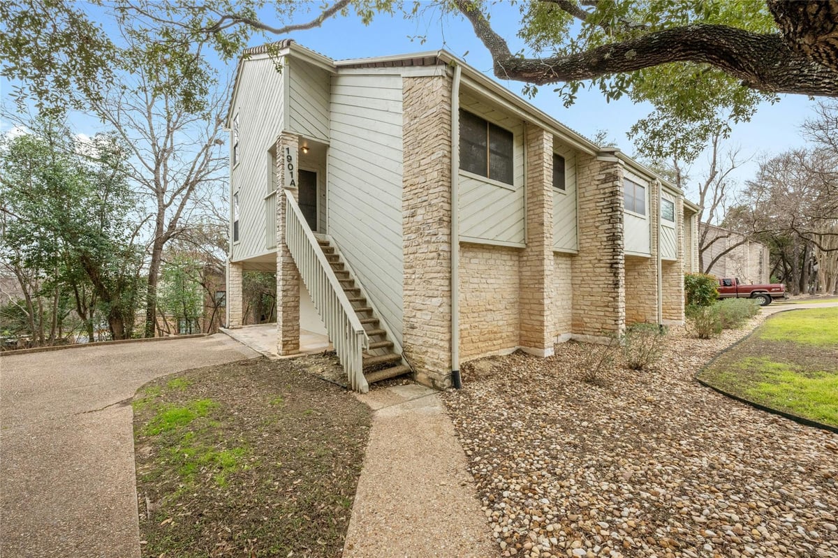 View 1901 Crested Butte DR Unit #A in Crested Butte Hillside Condomi 1901 Crested Butte DR Unit #A - front exterior - Luxury home in Crested Butte Hillside Condomi, Austin, TX