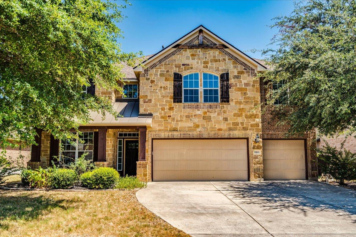 View 19013 Calming Stream CV in Falcon Pointe Sec 12 19013 Calming Stream CV - property photo 1 - Luxury home in Falcon Pointe Sec 12, Pflugerville, TX