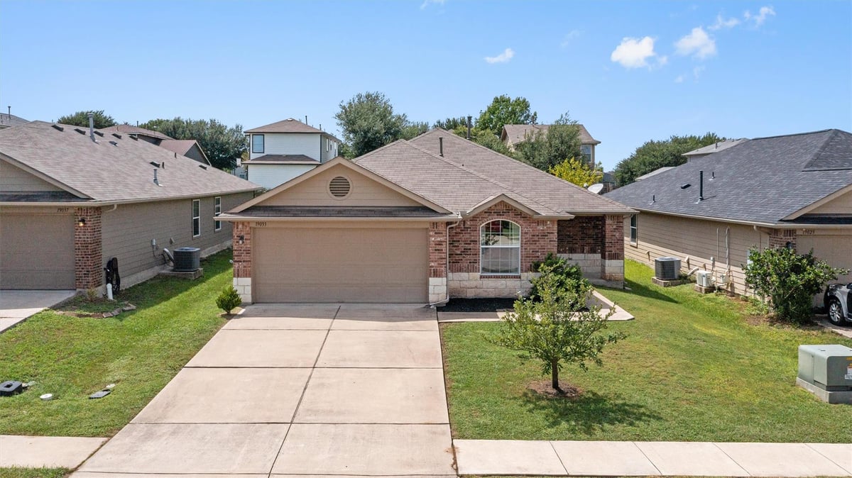 View 19033 Great Falls DR in Briarcreek Sub Sec 6-B 19033 Great Falls DR - front exterior - Luxury home in Briarcreek Sub Sec 6-B, Manor, TX