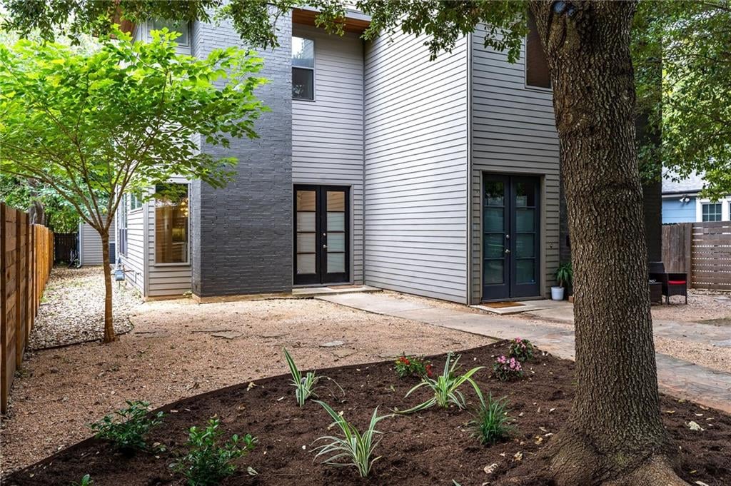 View 1905 W 36th St Unit #A in Oakmont Heights 1905 W 36th St Unit #A - front exterior - Luxury home in Oakmont Heights, Austin, TX