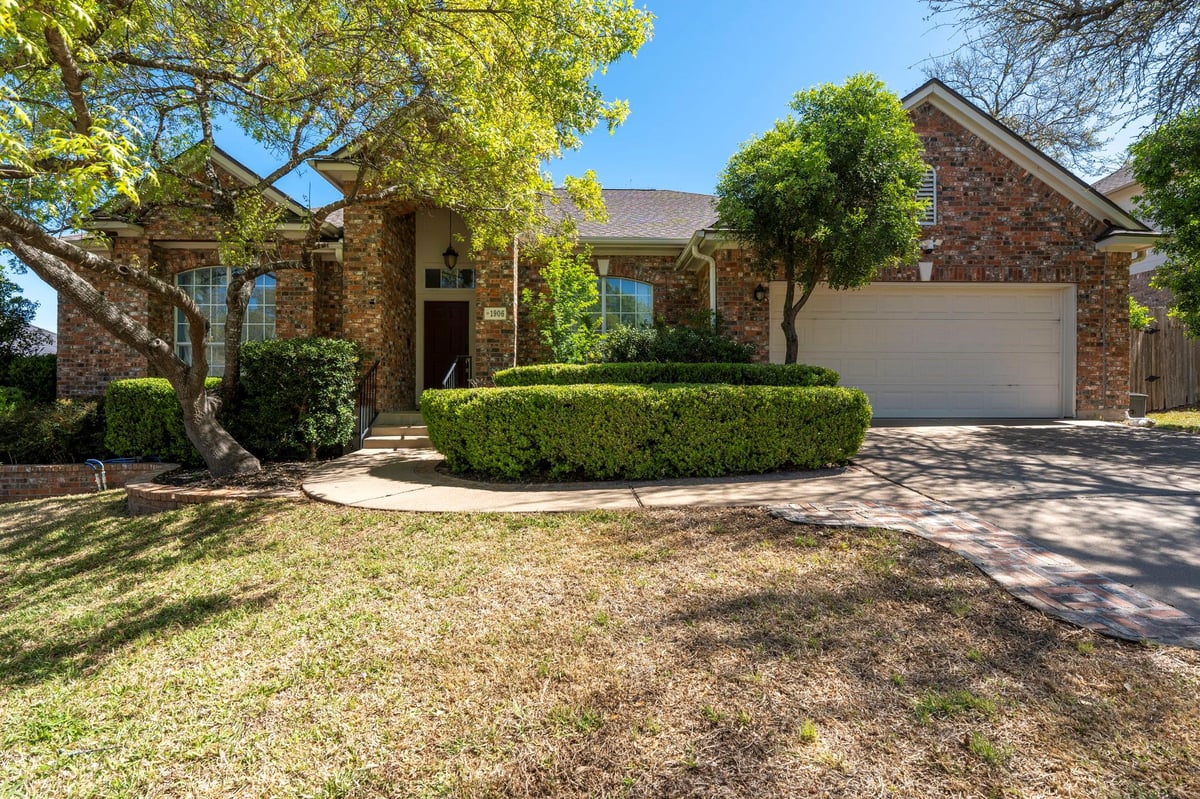 View 1906 Holly Hill Dr in Woods At Crystal Falls Sec 01 1906 Holly Hill Dr - front exterior - Luxury home in Woods At Crystal Falls Sec 01, Leander, TX