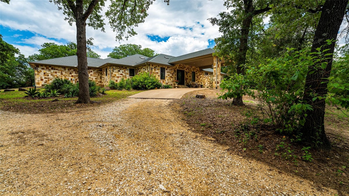 View 1908 County Road 305 in NONE 1908 County Road 305 - front exterior - Luxury home in NONE, Rockdale, TX