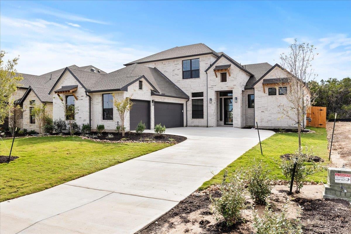 View 19105 Hopper LN in Sweetwater 19105 Hopper LN - front exterior - Luxury home in Sweetwater, Austin, TX