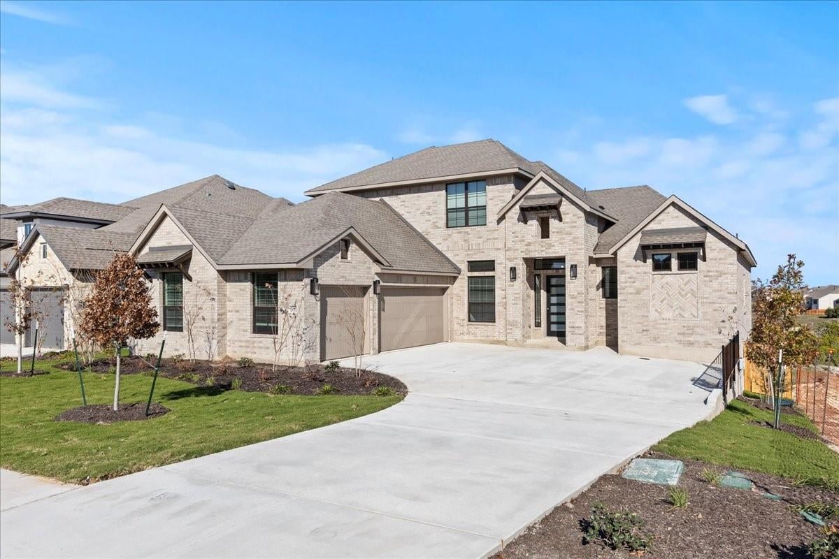 View 19112 Hopper LN in Sweetwater 19112 Hopper LN - front exterior - Luxury home in Sweetwater, Austin, TX