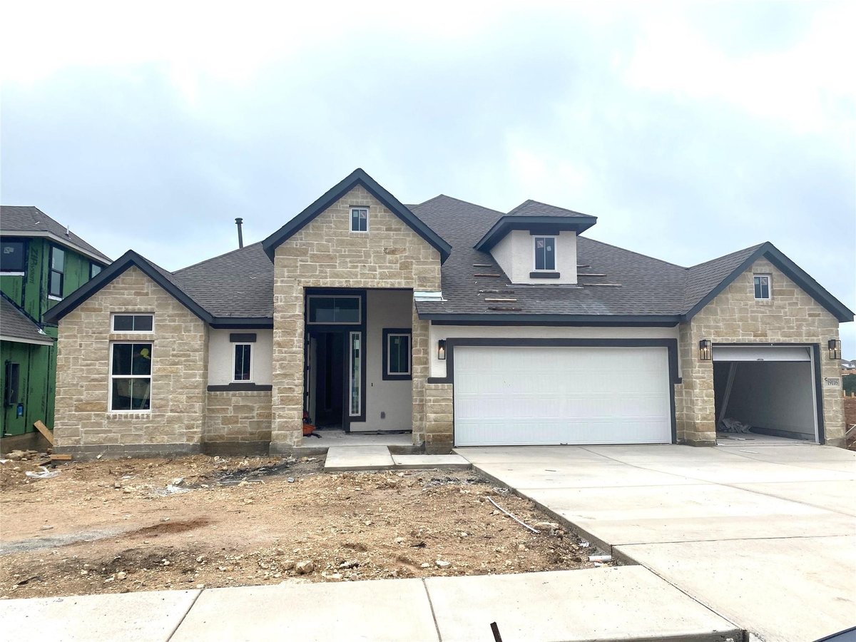 View 19116 Hopper LN in Sweetwater 19116 Hopper LN - front exterior - Luxury home in Sweetwater, Austin, TX