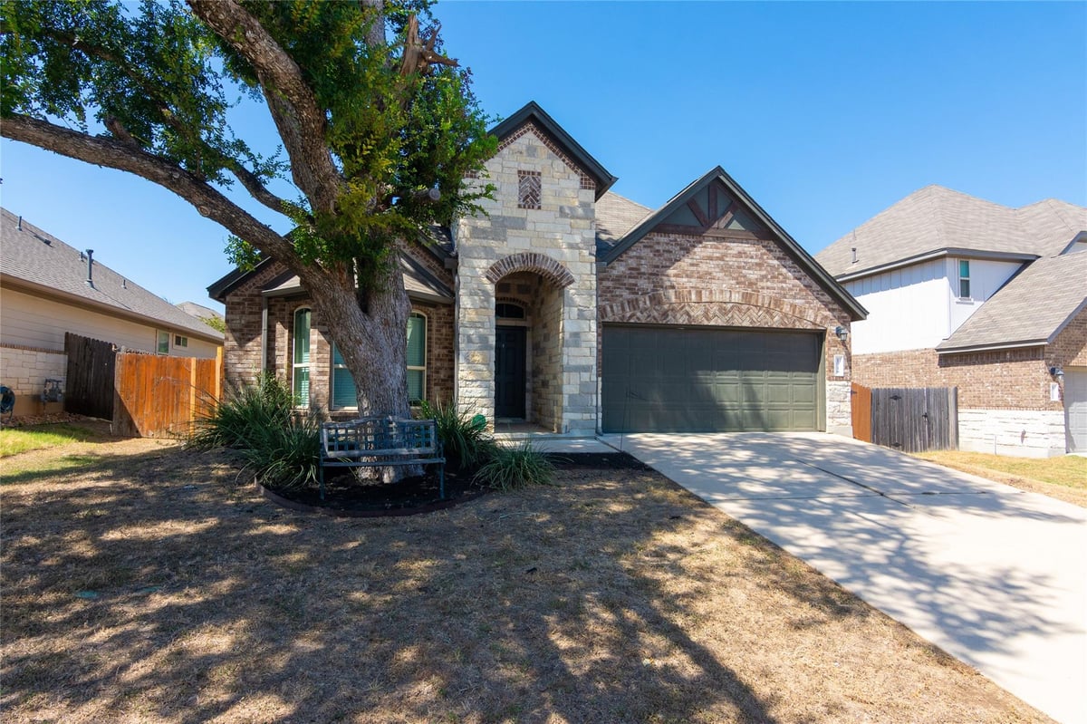 View 1916 Bobbywoods LN in Hills Of Bear Creek Sec 3 1916 Bobbywoods LN - property photo 1 - Luxury home in Hills Of Bear Creek Sec 3, Manchaca, TX