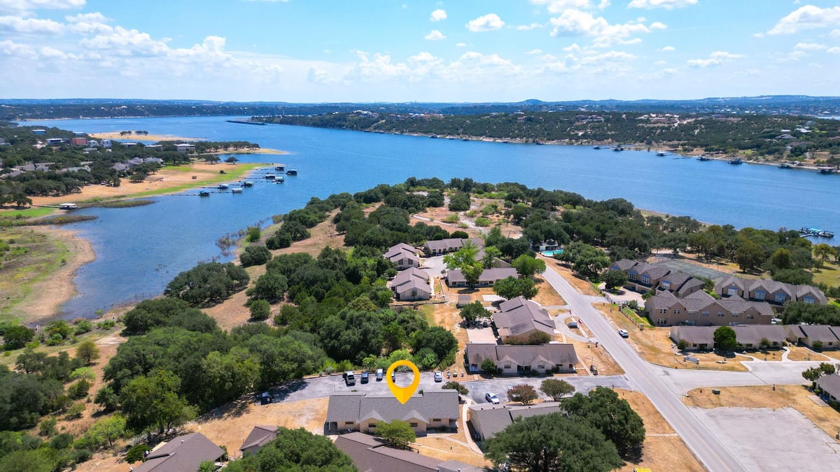 View 1919 American DR Unit #C103 in Highland Lake Villas Resub 1919 American DR Unit #C103 - property photo 1 - Luxury home in Highland Lake Villas Resub, Lago Vista, TX