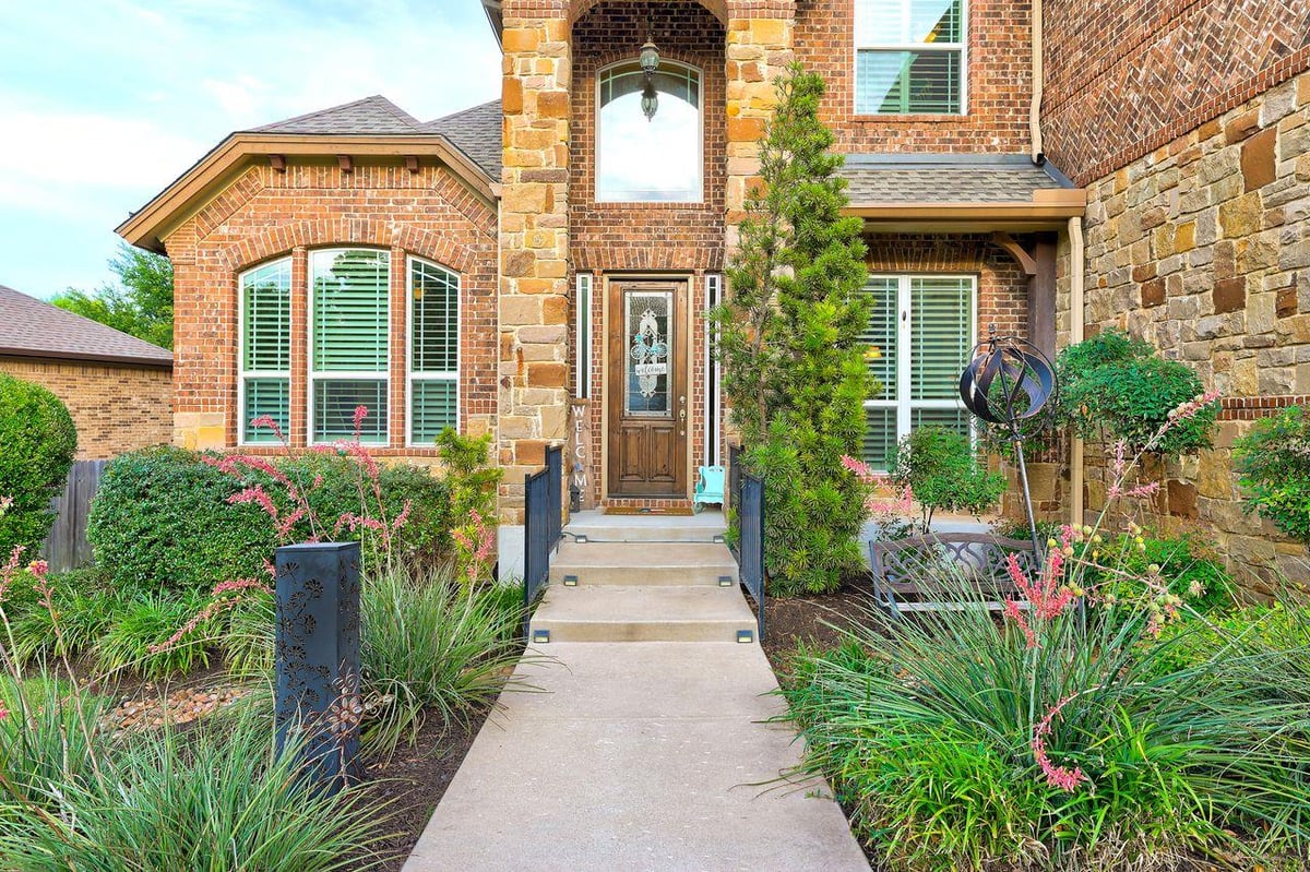 View 1919 Mulligan DR in Forest Creek Sec 12 1919 Mulligan DR - front exterior - Luxury home in Forest Creek Sec 12, Round Rock, TX