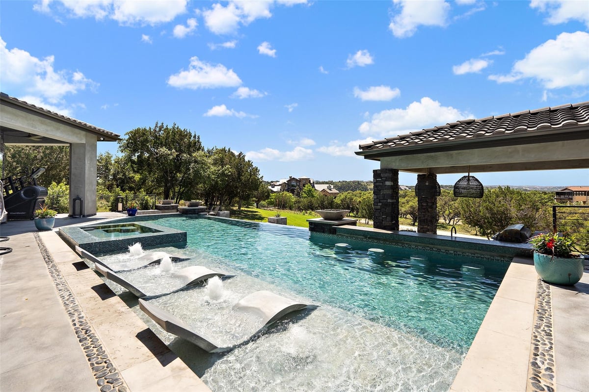 View 19204 Secretariat PL in Reserve At Lake Travis 19204 Secretariat PL - front exterior - Luxury home in Reserve At Lake Travis, Spicewood, TX