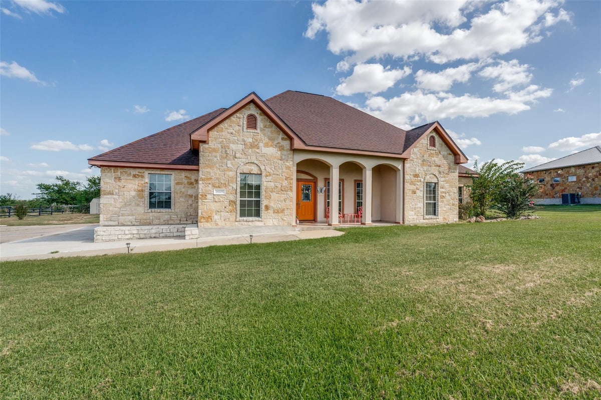 View 19205 Saint Raguel RD in Bella Vista At Cottonwood Cree 19205 Saint Raguel RD - property photo 1 - Luxury home in Bella Vista At Cottonwood Cree, Manor, TX