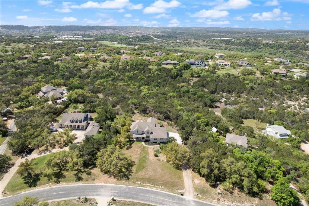 View 19215 White Horse Cv in Travis Settlement Sec 01 19215 White Horse Cv - front exterior - Luxury home in Travis Settlement Sec 01, Spicewood, TX