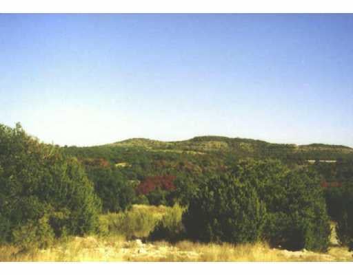 View 19216 White Horse Cv 19216 White Horse Cv - front exterior - Luxury lot in Spicewood, TX