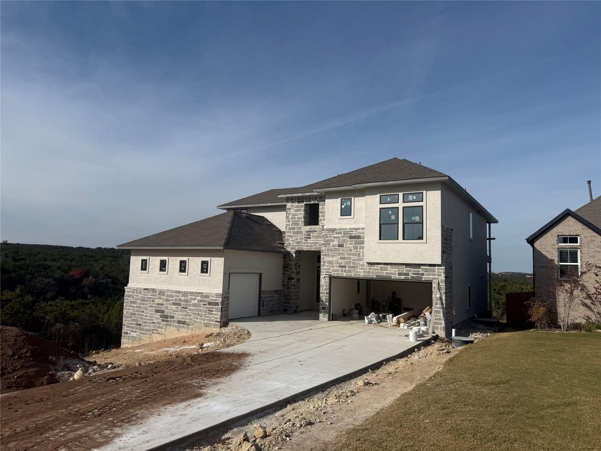 View 19233 Hopper LN in Sweetwater 19233 Hopper LN - front exterior - Luxury home in Sweetwater, Austin, TX