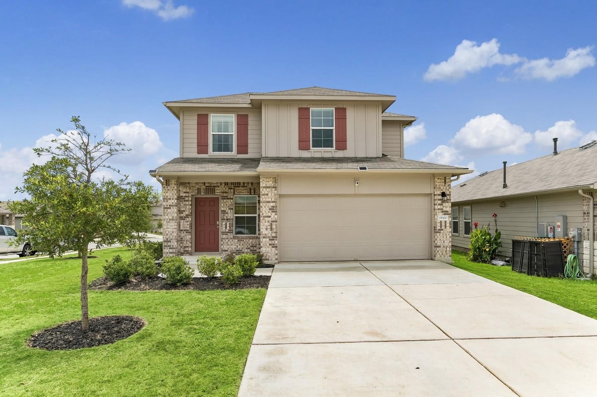 View 19300 Bear Grass DR in Peppergrass Ph 1C 19300 Bear Grass DR - front exterior - Luxury home in Peppergrass Ph 1C, Elgin, TX
