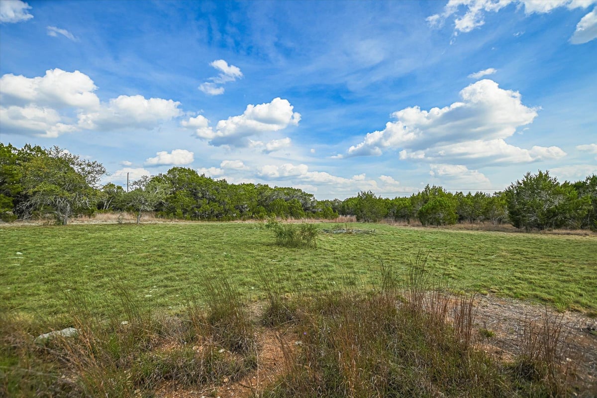 Primary bedroom at 1935 Wayside Dr - Blanco River Ranch Estates, Wimberley, TX