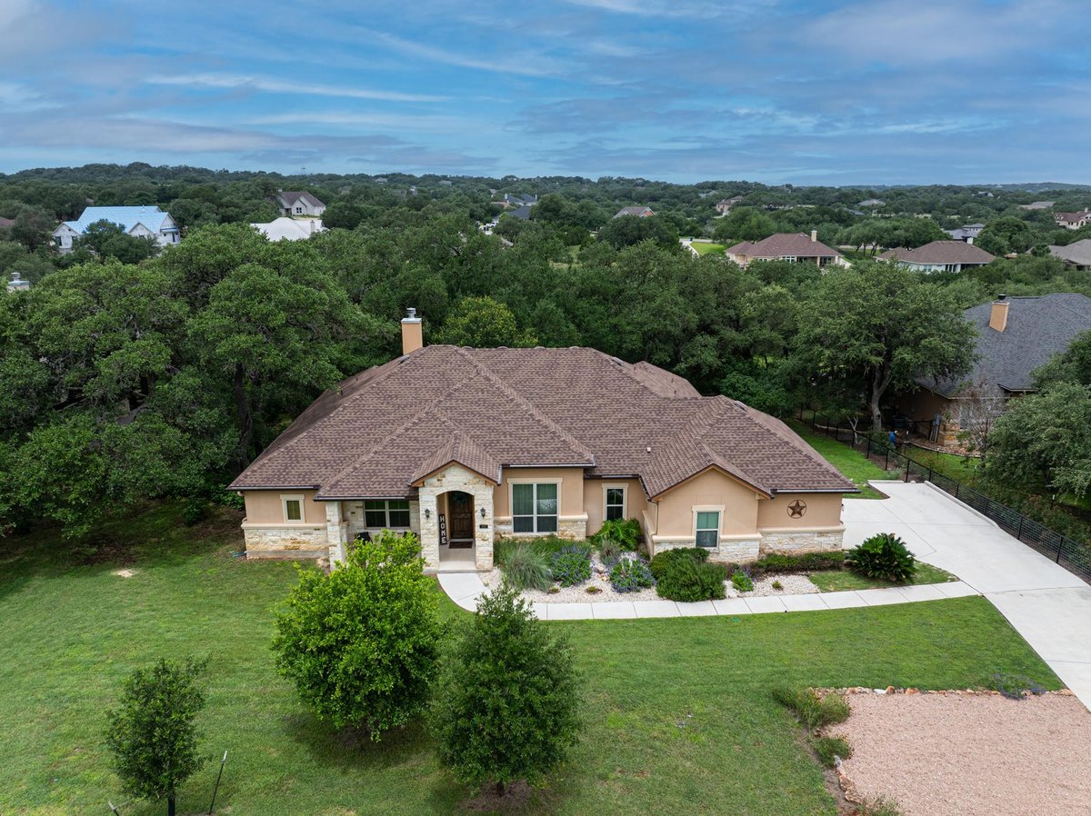 View 1937 Hunters Cv in River Chase 1937 Hunters Cv - property photo 1 - Luxury home in River Chase, New Braunfels, TX