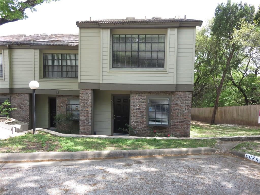 View 1938 Holly Hill DR Unit #5 in Barton Creek Twnhms Amd 1938 Holly Hill DR Unit #5 - front exterior - Luxury home in Barton Creek Twnhms Amd, Austin, TX