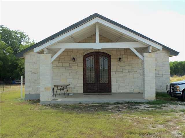 View 1940 Goforth RD 1940 Goforth RD - front exterior - Luxury home in Kyle, TX