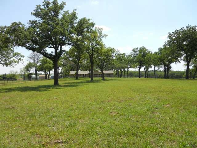 View 195 Rosanky Cattle Company RD 195 Rosanky Cattle Company RD - front exterior - Luxury home in Smithville, TX