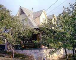 View 1951 Montell Rd 1951 Montell Rd - front exterior - Luxury home in Wimberley, TX