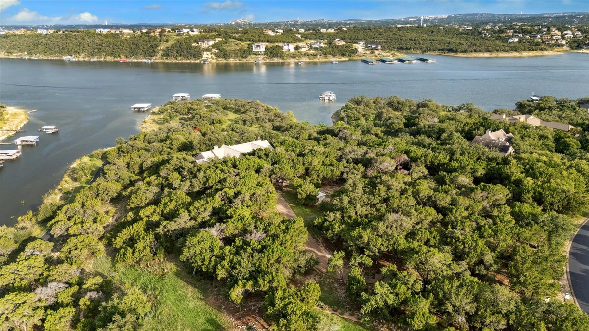 19586 Sandcastle Dr - front exterior - Luxury home in Coves On Lake Travis Ph 1 Sec, Spicewood, TX