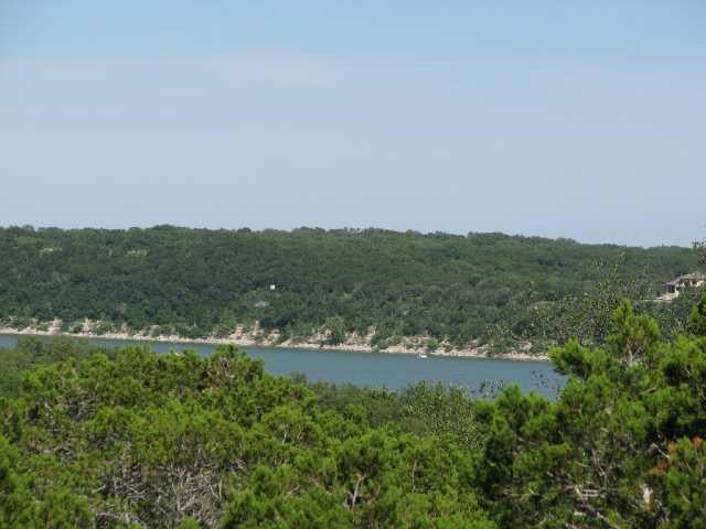 View 19604 Sandcastle DR 19604 Sandcastle DR - front exterior - Luxury lot in Spicewood, TX