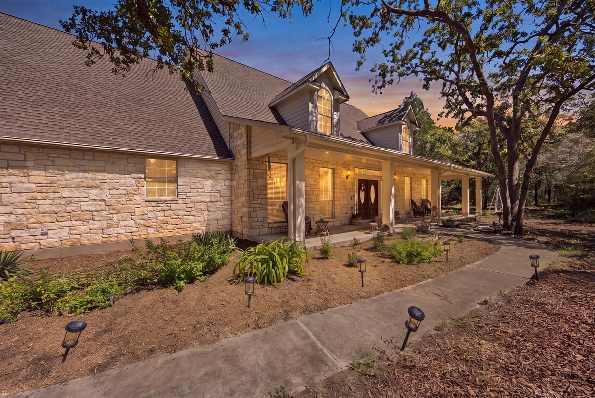 View 197 Elm Wood DR in The Arbors At Dogwood Creek 197 Elm Wood DR - front exterior - Luxury home in The Arbors At Dogwood Creek, Elgin, TX