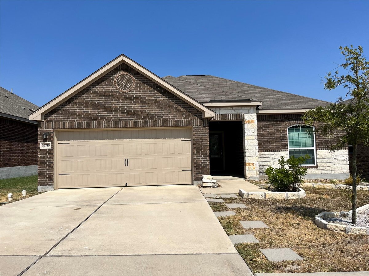 View 19716 W.T. Gallaway St in Presidential Glen PH4 19716 W.T. Gallaway St - front exterior - Luxury home in Presidential Glen PH4, Manor, TX