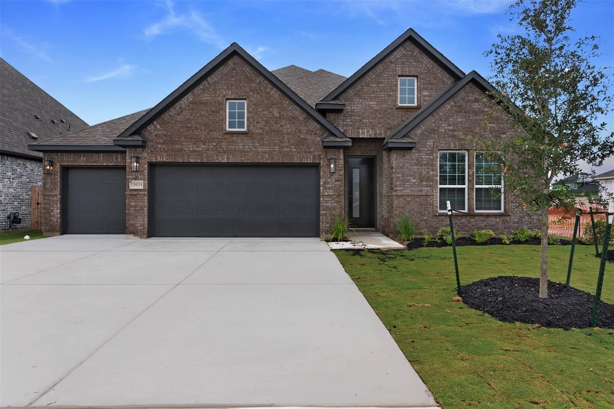View 19733 Helens Catch DR in Grove at Blackhawk 19733 Helens Catch DR - front exterior - Luxury home in Grove at Blackhawk, Pflugerville, TX