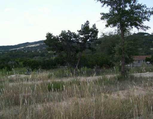 View 19808 Dos Amigo DR 19808 Dos Amigo DR - front exterior - Luxury lot in Lago Vista, TX
