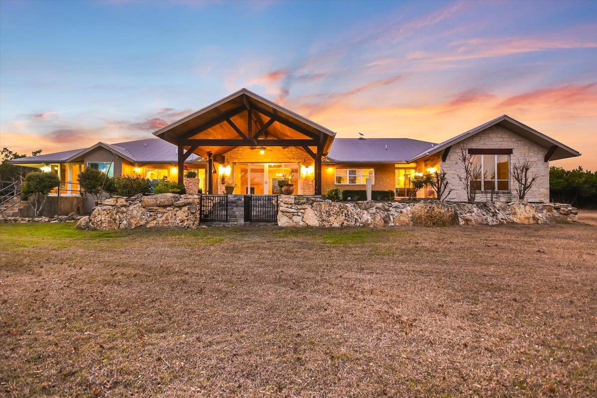 View 1984 Divide Pass in The Divide 1984 Divide Pass - front exterior - Luxury home in The Divide, Blanco, TX