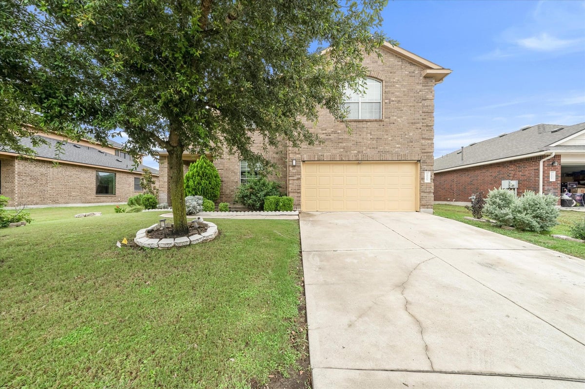 View 19909 Harrier Flight TRL in Park At Blackhawk Vi Sec 1 The 19909 Harrier Flight TRL - front exterior - Luxury home in Park At Blackhawk Vi Sec 1 The, Pflugerville, TX