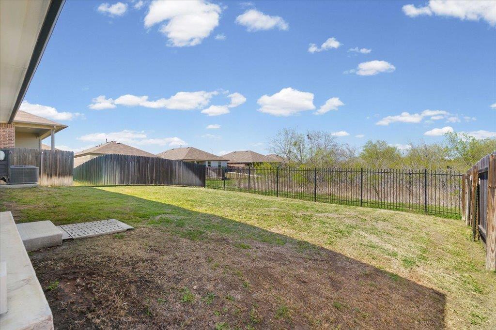 19916 Ann Richards Ave - front exterior - Luxury home in Manor Heights South Ph 1 Sec 1, Manor, TX