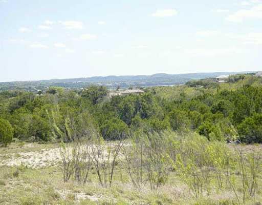 View 19924 Thurman Bend RD 19924 Thurman Bend RD - front exterior - Luxury lot in Spicewood, TX