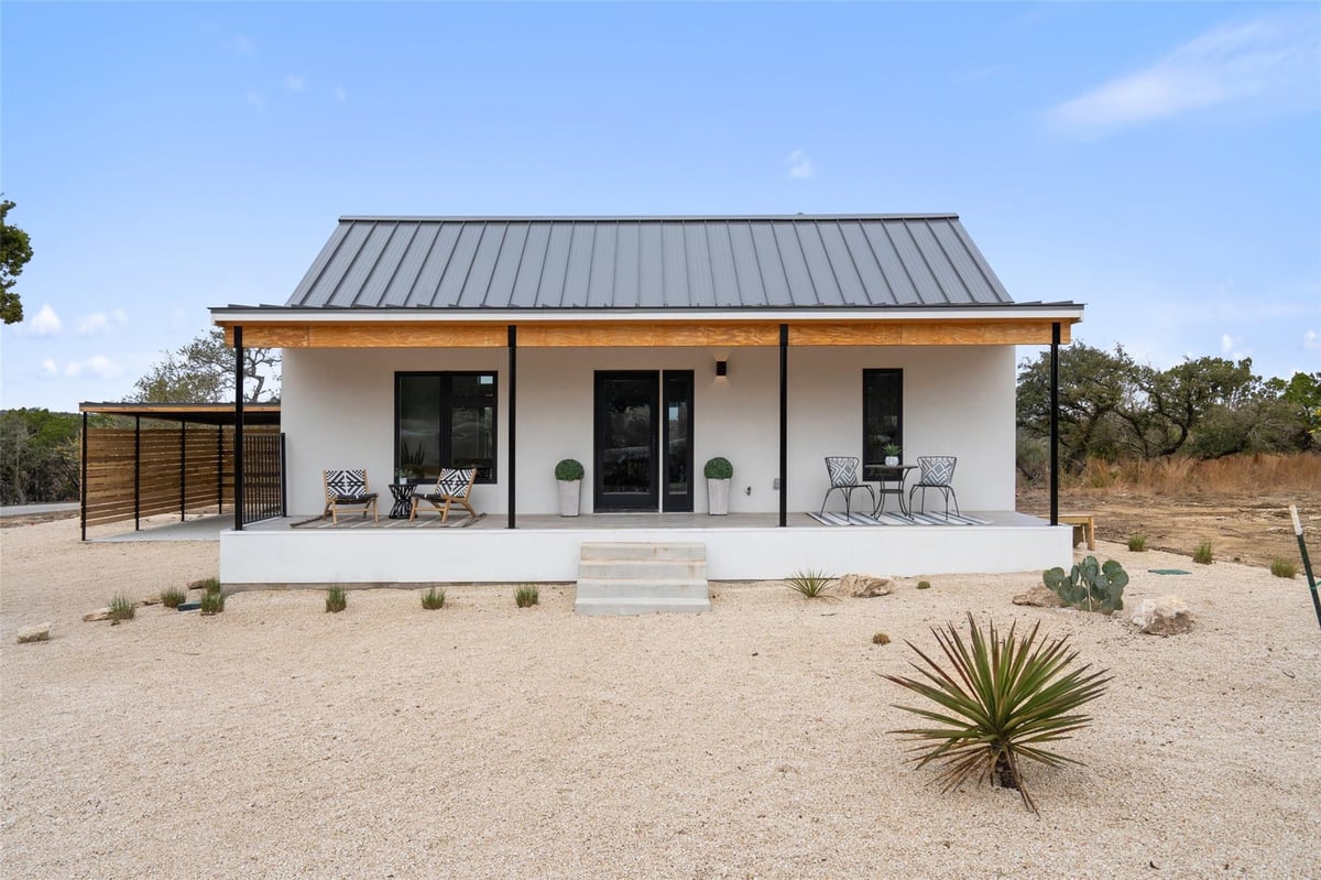 View 2 Shilo Cir in Wimberley Springs 2 Shilo Cir - front exterior - Luxury home in Wimberley Springs, Wimberley, TX