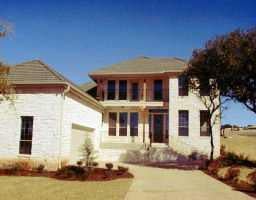 View 2 Waterfall Dr in HILLS OF LAKEWAY PHS 4 THE 2 Waterfall Dr - front exterior - Luxury home in HILLS OF LAKEWAY PHS 4 THE, Austin, TX