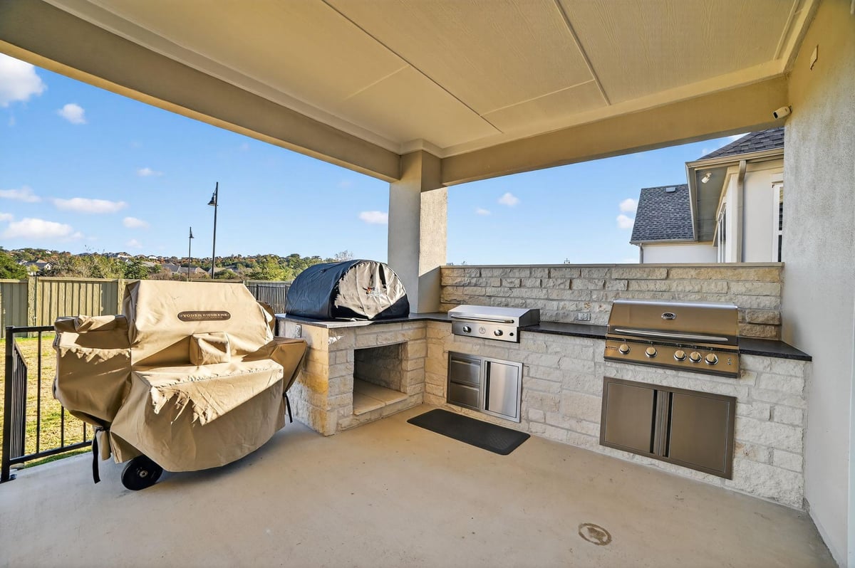 View 200 Alava Way in Regency at Santa Rita Ranch 200 Alava Way - front exterior - Luxury home in Regency at Santa Rita Ranch, Liberty Hill, TX