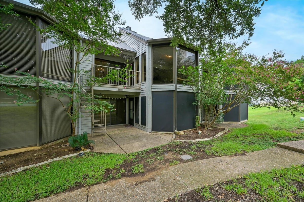 Primary bedroom at 200 World Of Tennis Sq Unit #200 - 3 bed 3 bath home