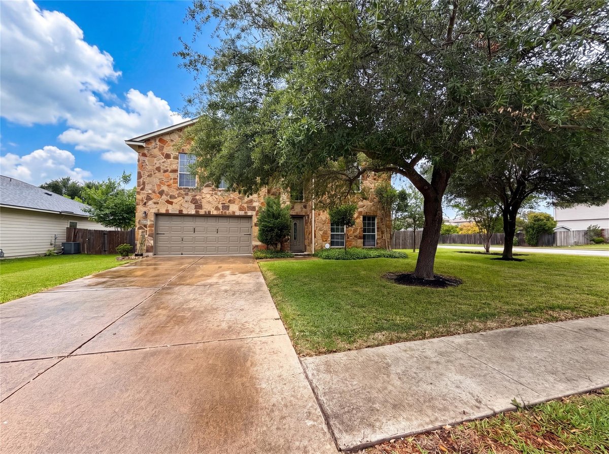 View 2002 Concan Dr in ENCLAVE AT BRUSHY CREEK 2002 Concan Dr - front exterior - Luxury home in ENCLAVE AT BRUSHY CREEK, Hutto, TX