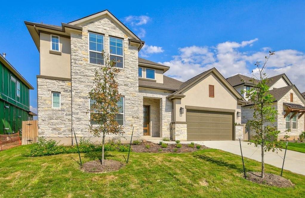 View 20028 Crested Caracara Ln in Park at Blackhawk 20028 Crested Caracara Ln - front exterior - Luxury home in Park at Blackhawk, Pflugerville, TX