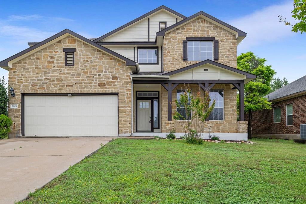 View 2003 Cockrill Cv in Hutto Highlands Sec 01 Ph A 2003 Cockrill Cv - front exterior - Luxury home in Hutto Highlands Sec 01 Ph A, Hutto, TX