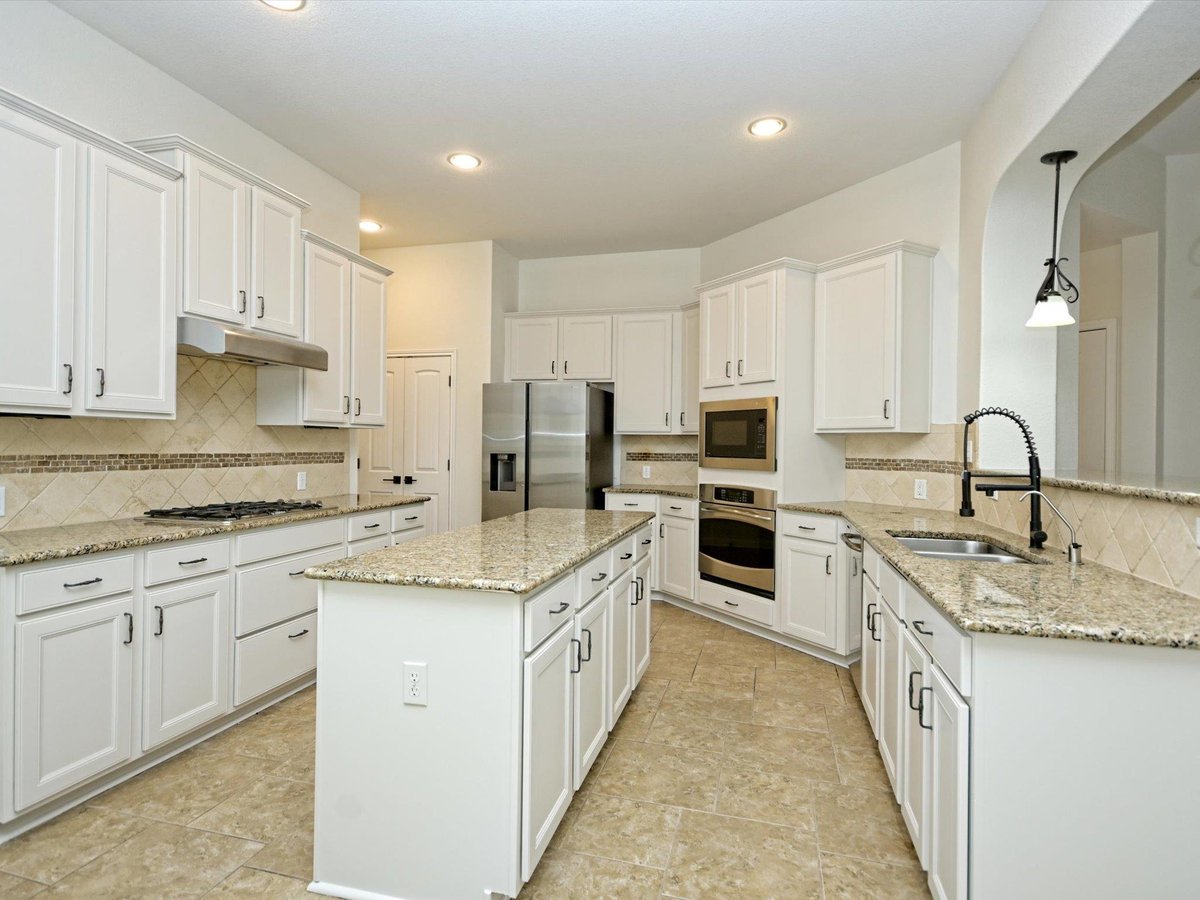 Primary bedroom at 201 Bellagio Dr - 4 bed 3 bath home