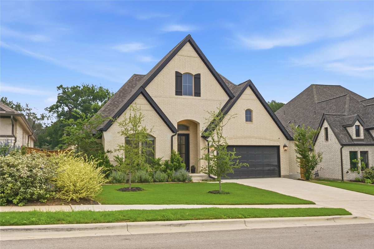 View 201 Brewer St in 6 Creeks Ph 1 Sec 9 201 Brewer St - front exterior - Luxury home in 6 Creeks Ph 1 Sec 9, Kyle, TX