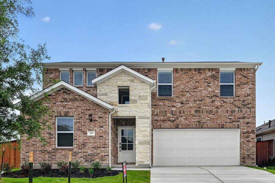View 201 Makinaw Rd in Emory Crossing 201 Makinaw Rd - front exterior - Luxury home in Emory Crossing, Hutto, TX