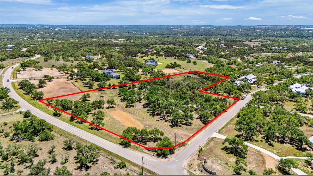 View 201 Medlin Creek Loop in Medlin Creek Ranch Ph One 201 Medlin Creek Loop - front exterior - Luxury lot in Medlin Creek Ranch Ph One, Dripping Springs, TX