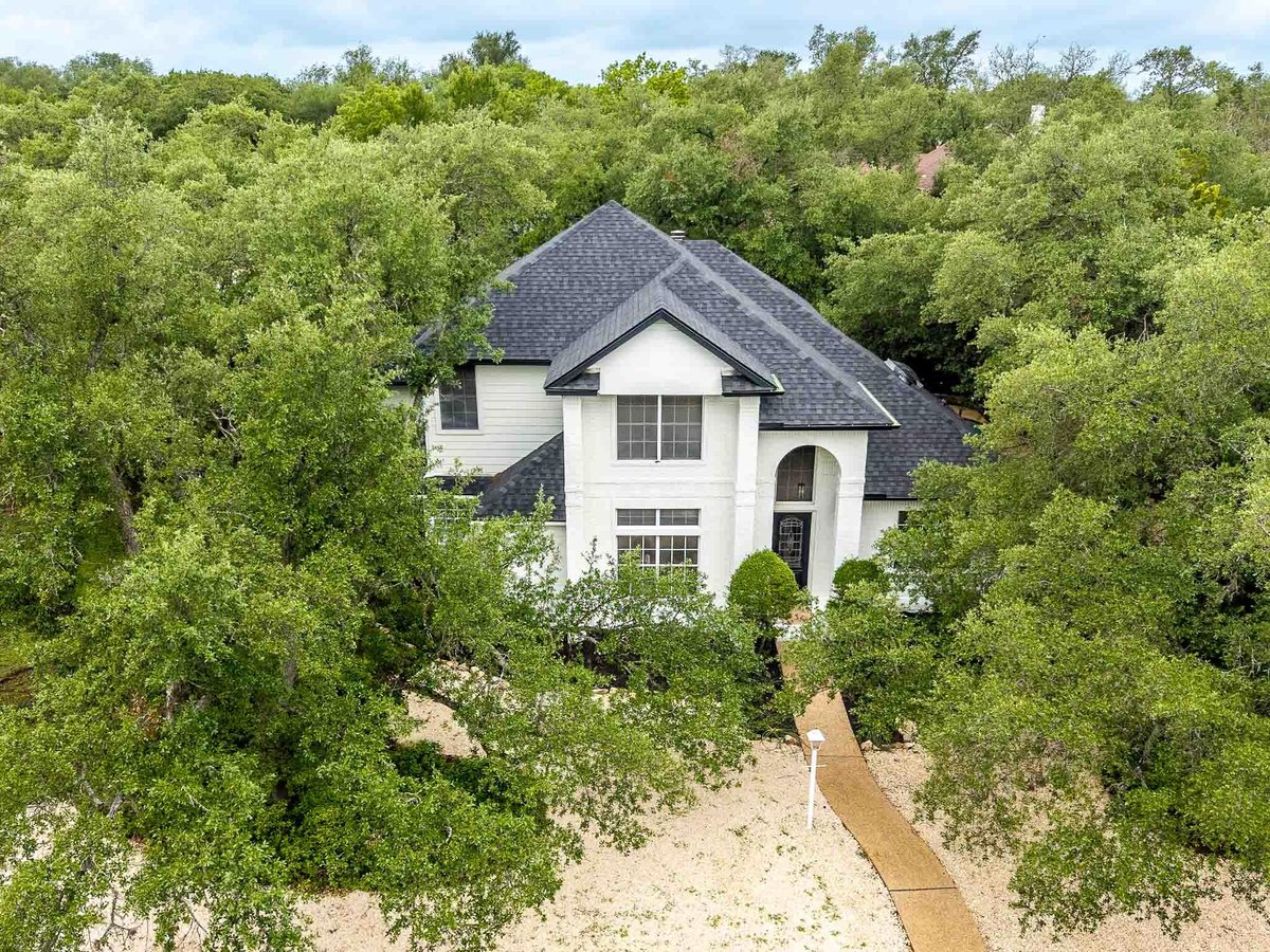 201 Timpanagos Dr - front exterior - Luxury home in Lakeway Sec 26, Lakeway, TX