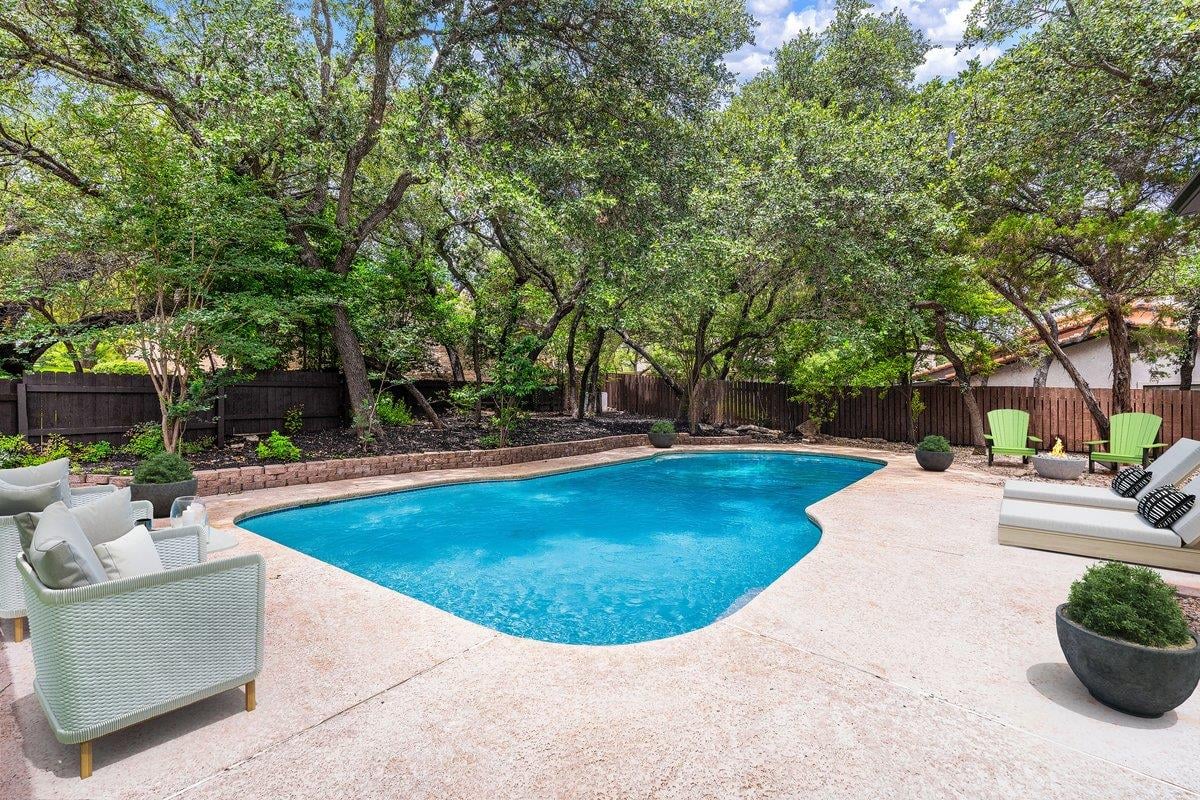 View 201 Timpanagos DR in Lakeway Sec 26 201 Timpanagos DR - front exterior - Luxury home in Lakeway Sec 26, Lakeway, TX