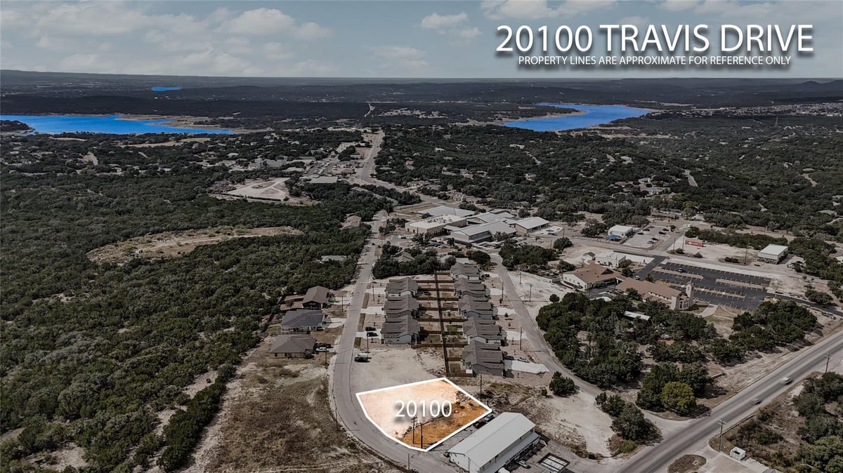 View 20100 TRAVIS Dr in Lago Vista Civic Center Add 20100 TRAVIS Dr - front exterior - Luxury lot in Lago Vista Civic Center Add, Lago Vista, TX