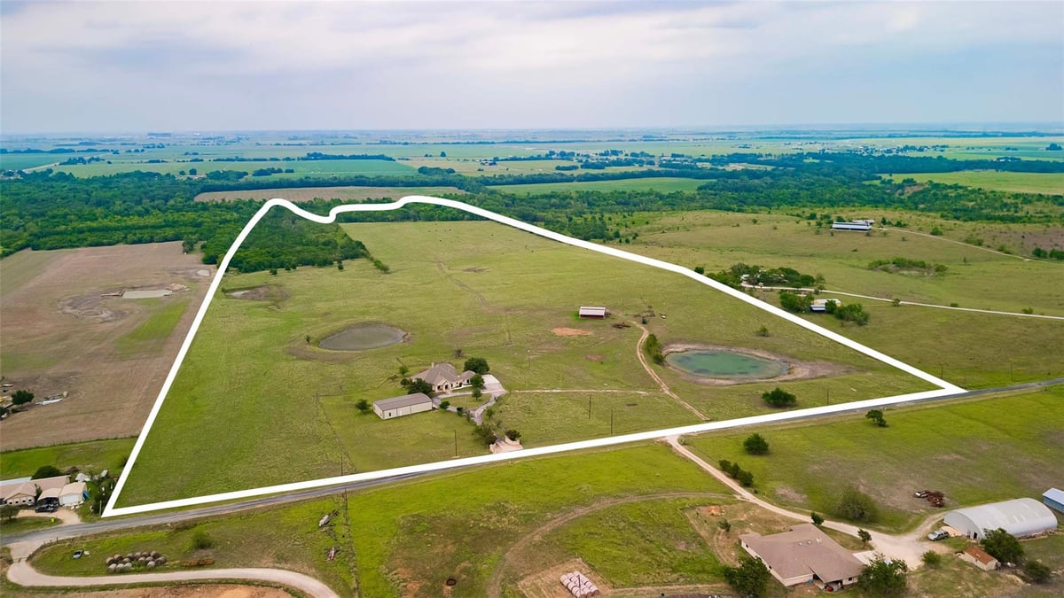 View 20145 Janak Rd in Hays Wm C Sur 20145 Janak Rd - front exterior - Luxury home in Hays Wm C Sur, Coupland, TX