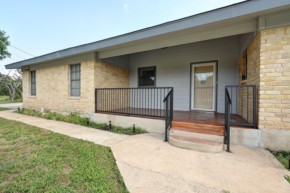 View 2018 Chaparral Park Rd in Chaparral Park Sec 1 2018 Chaparral Park Rd - front exterior - Luxury home in Chaparral Park Sec 1, Manchaca, TX